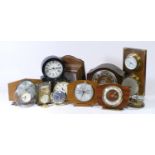 A collection of clocks, including mechanical and quartz, from brands such as Smiths, Rhythm, Lincoln