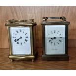A Garrard & Co Ltd brass 8 day carriage clock, 12cm tall, together with an unnamed example. (2)