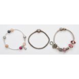 Pandora, three silver charm bracelets, 75gm