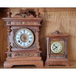 An early 20th century oak cased American Ansonia mantel clock, with 8 day movement striking on gong,