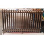 A Victorian style cast iron radiator. (as new) 112cm long, 75cm height.