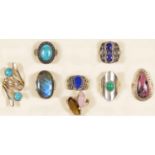 Eight silver and gemset rings, various sizes, 65gm.