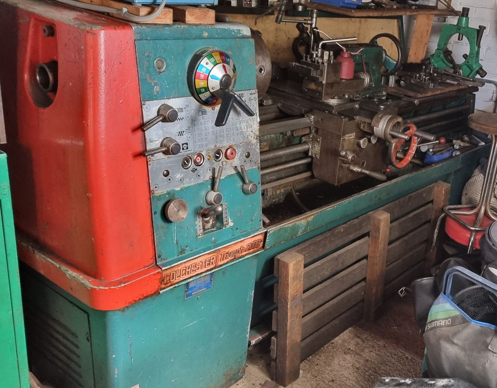 A Colchester Triumph 2000 3 phase/240 volt bed lathe, with various attachments, in working order.