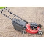 A Mountfield petrol driven lawnmower, having a Briggs & Stratton engine, model number-S510 PD.