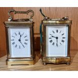 Two early 20th century French carriage clocks, having enamelled dials with Roman numerals and 8