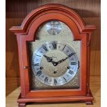 A modern Rapport mahogany cased German bracket clock, the gilt brass dial with Roman numerals