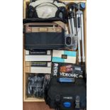 A collection of camera accessories, to include a The North Face camera bag, a Canon WP-DC21