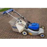 A Yamaha self propelled petrol powered lawn mower, with electric start, model number YLM 453.