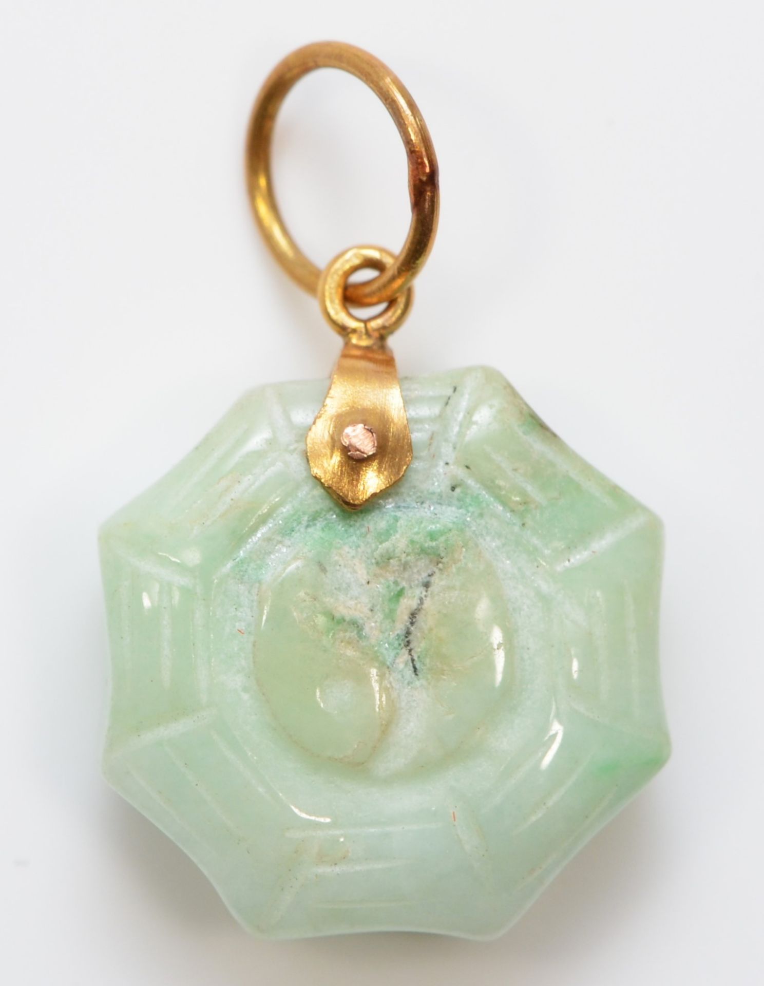 A gold mounted jadeite Yin/Yan pendant with spiders web border, 15 x 4mm - Image 2 of 2