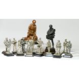 Thirteen cold cast military figures, to include WWII paratrooper, Royal Marine, French Foreign