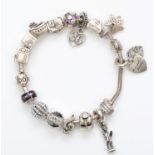 Pandora, a silver charm bracelet, box, 67gm