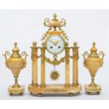 J. Bernard, Montlucon, a 19th century French cream variegated marble and ormolu clock garniture, the