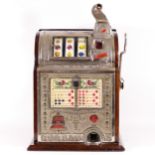 A Mills Operators Bell Spearmint slot machine, one arm bandit, c.1915, restored and working on a
