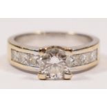 A white gold and brilliant cut diamond single stone ring, tests as 18ct, approximately 0.70cts,