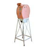 A Reel Co Inc, New York Mutoscope (1016 M) with floral decoration, painted metal in peach and