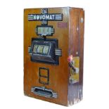 A Novomat slot machine, one arm bandit, c.1950's, works on a old 2p coin, wooden case with cast