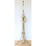 An Arts and Craft W.A.S. Benson style adjustable standard lamp, raised on a tripod base, 145 -
