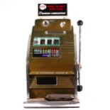 A Mills Golden star light up slot machine, one arm bandit, c.1960's, working on a sixpence 6D