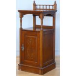 An Edwardian mahogany two tier washstand, the gallery top with turned supports above an inlaid