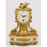 A French 19th century ormolu and white onyx mantel time piece, white enamel dial with floral