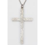 A vintage solid silver cross pendant, Birmingham 1972, with engraved floral decoration, 8 x 4.5cm,