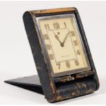 A LeCoultre, Art deco desk/travel clock, c. 1930/35, off white dial with luminescent Arabic