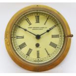 Henry Browne & Sons Ltd., Barking & London, a brass Sestral bulkhead clock , 5 1/2" white enamel