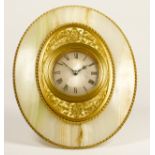 A gilt brass and onyx strut timepiece, retailed by Harry Grant, 29 Torwood St, Torquay, circa