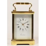 A E'Pee for Eurotime, French brass carriage time piece, white enamel dial with Roman numerals,