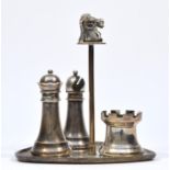 Asprey & Co. Ltd, a silver chess related three piece cruet set, London 1961/65/67, the triangular