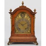 Winterhalder & Hofmeier, a late 19th century walnut arched mantel clock, gilt dial with silvered