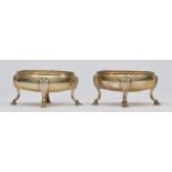 A George III silver pair of oval table salts, by Henry Chawner, London 1789, with reeded borders,