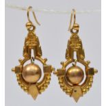 A Victorian pair of 9ct gold hollow drop ear rings, stamped 9c, articulated balls, 30mm, 2.6gm