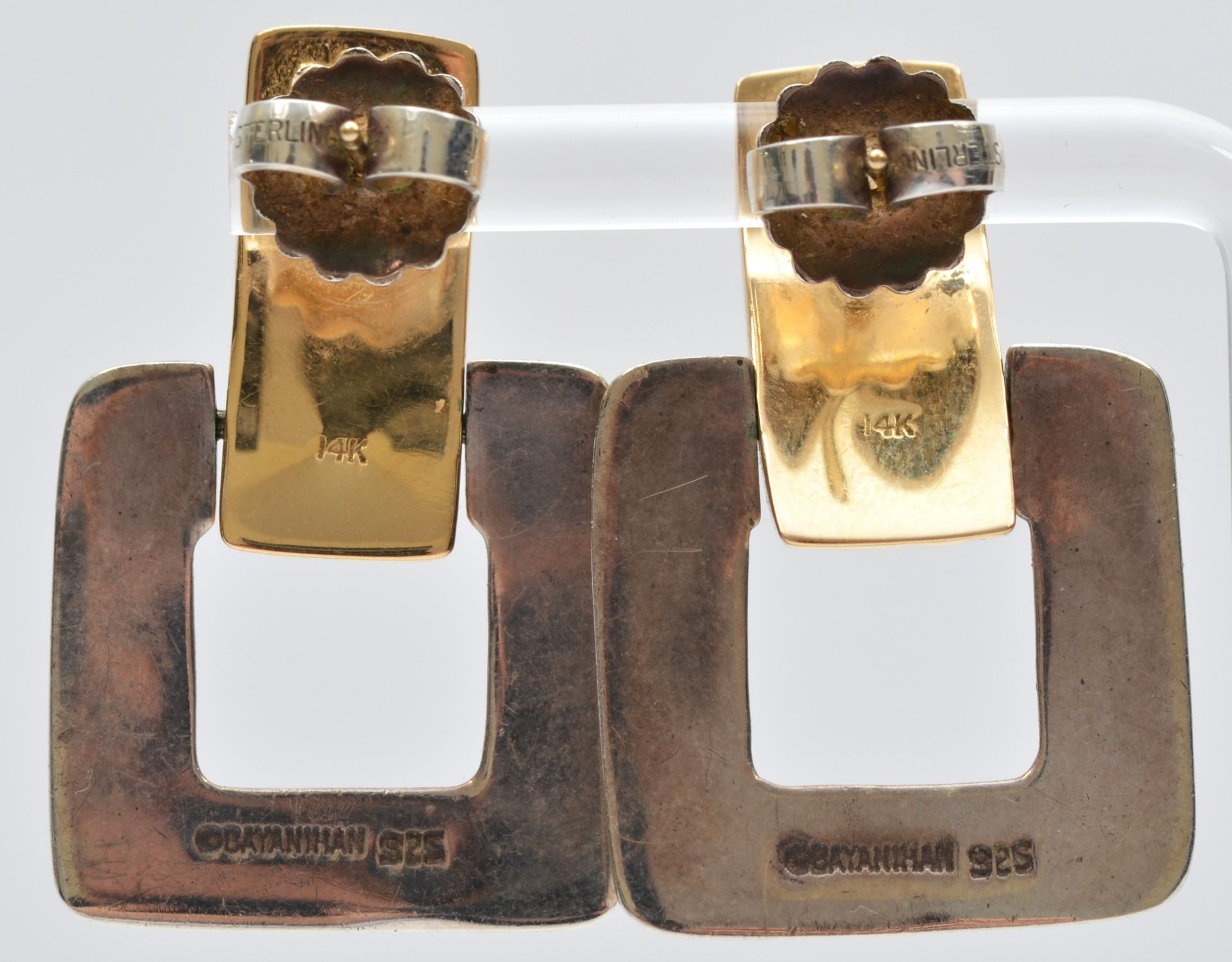 Bayanihan, a 14K gold and silver pair of Modernist ear rings, signed, 35 x 22mm, 11gm. The Bayanihan - Image 2 of 3
