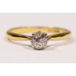 An 18ct gold single stone diamond ring, claw set with an old cut brilliant stone, weighing