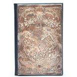 A silver covered address book, London 1991, with embossed courting couple scene, unused, 12 x 8cm
