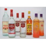 Seven bottles of spirits and liqueurs, to include Smirnoff, 70cl (x2), Orchards Peach Schnapps,