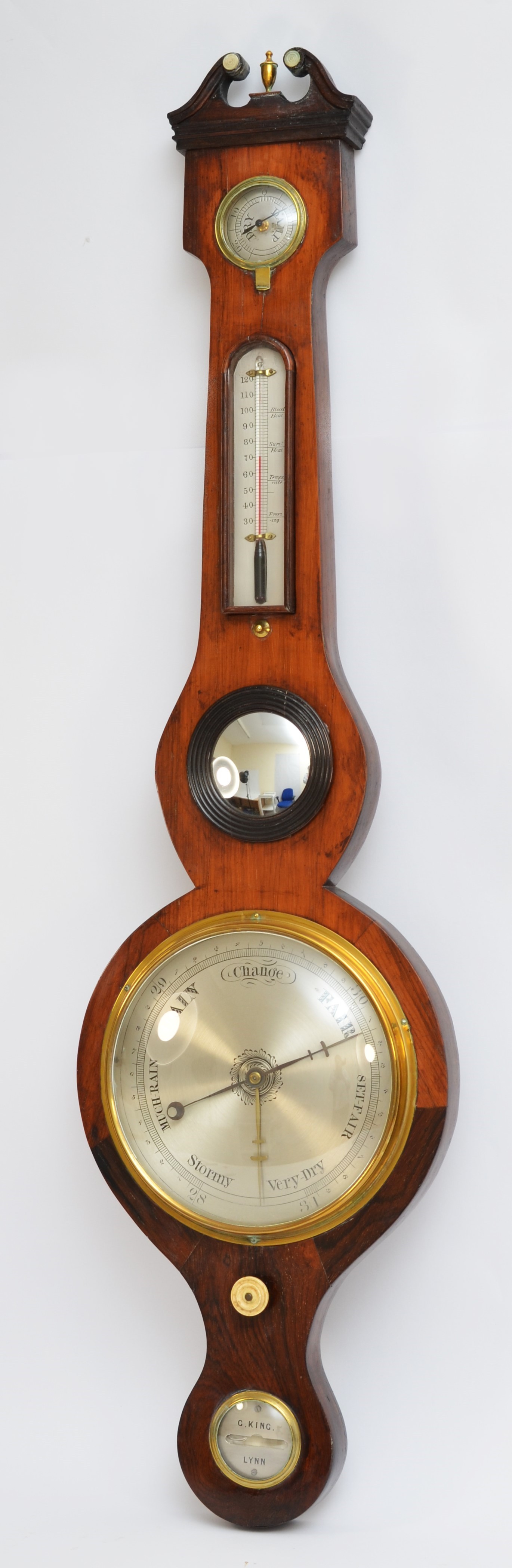 G. King, Lynn, a George III mahogany five glass wheel barometer, with 8" silvered dial, 97cm.