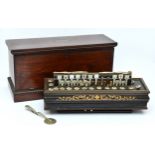 A 19th century French accordion, ebonised case with boxwood inlay and mother of pearl keys, rosewood