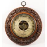 Stokes & Watson, Manchester, Victorian oak aneroid barometer, the signed 7 inch silvered dial within