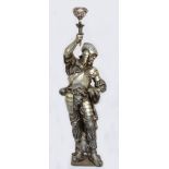 A late 19th/early 20th century French silvered metal figural lamp, in the form of a 16th century