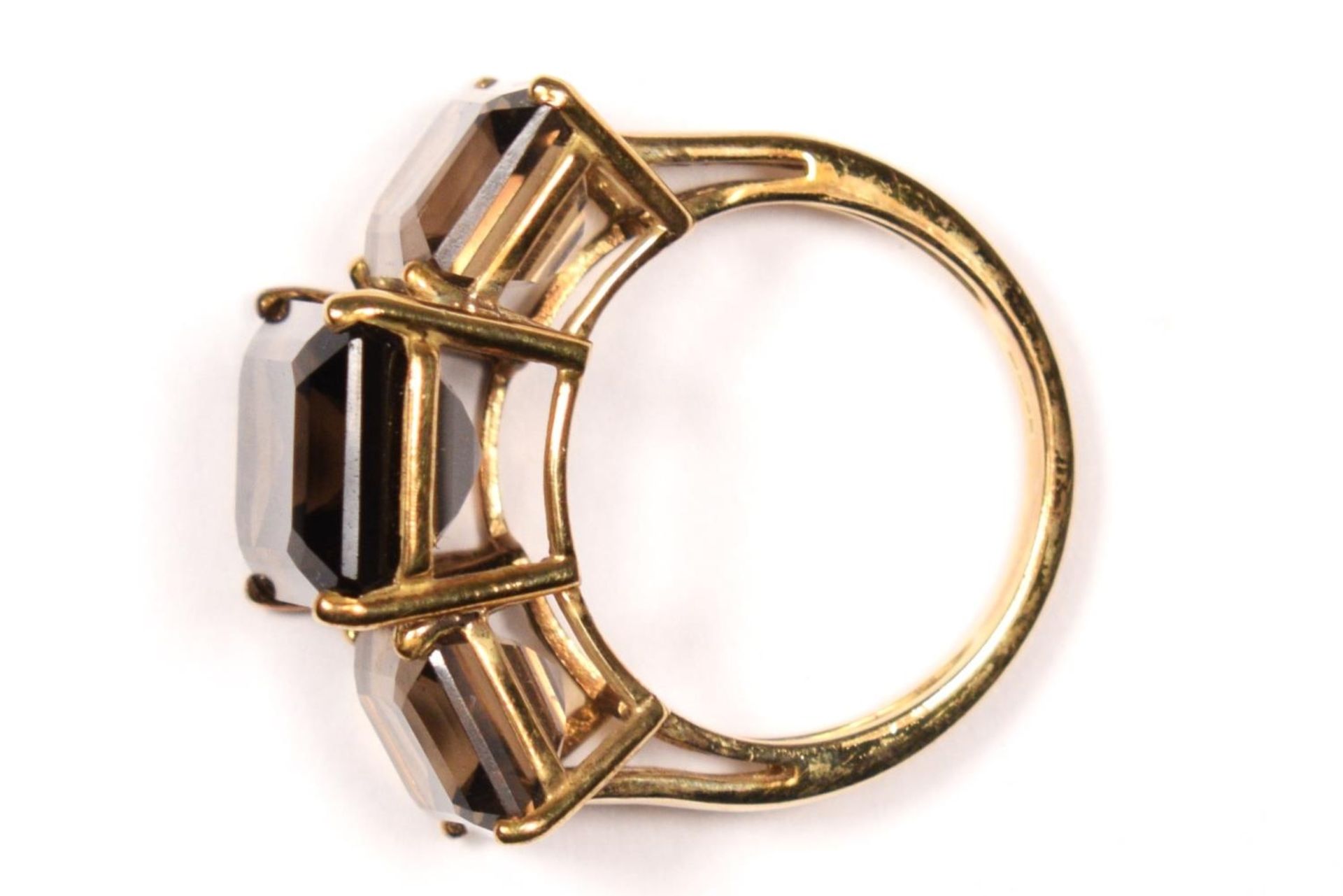 A vintage 9ct gold and smokey quartz three stone ring, the largest 14 x 9mm, N, 6.4gm. - Image 2 of 3