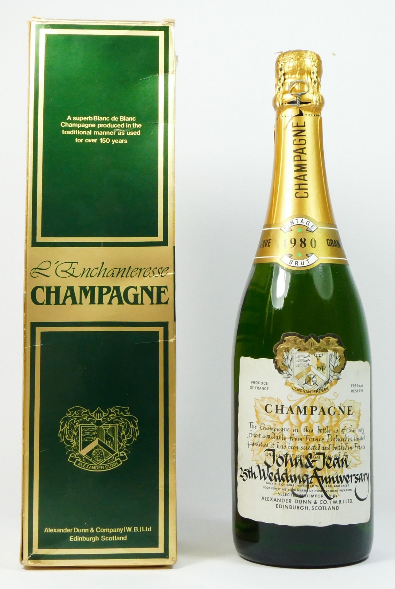 An L'Enchanteresse Grand Reserve champagne, 1980, 75cl, in original box, presented to John & Jean,
