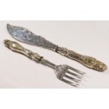 A Victorian silver pair of silver knife and fork, by Martin Hall & Co., Sheffield, 1853, the handles