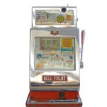 A Bell Fruit slot machine, one arm bandit, c.1970s, working on a old sixpence 6D coin, full metal