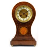 A Victorian mahogany balloon mantel clock, celluloid chapter ring, boxwood inlay, the movement