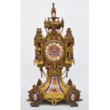 A French 19th century porcelain and ormolu mantel clock, the polychrome dial with blue Roman