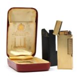 Dunhill, a 9ct gold rollagas cigarette lighter, London 1967, with engine turned decoration, 105gm,