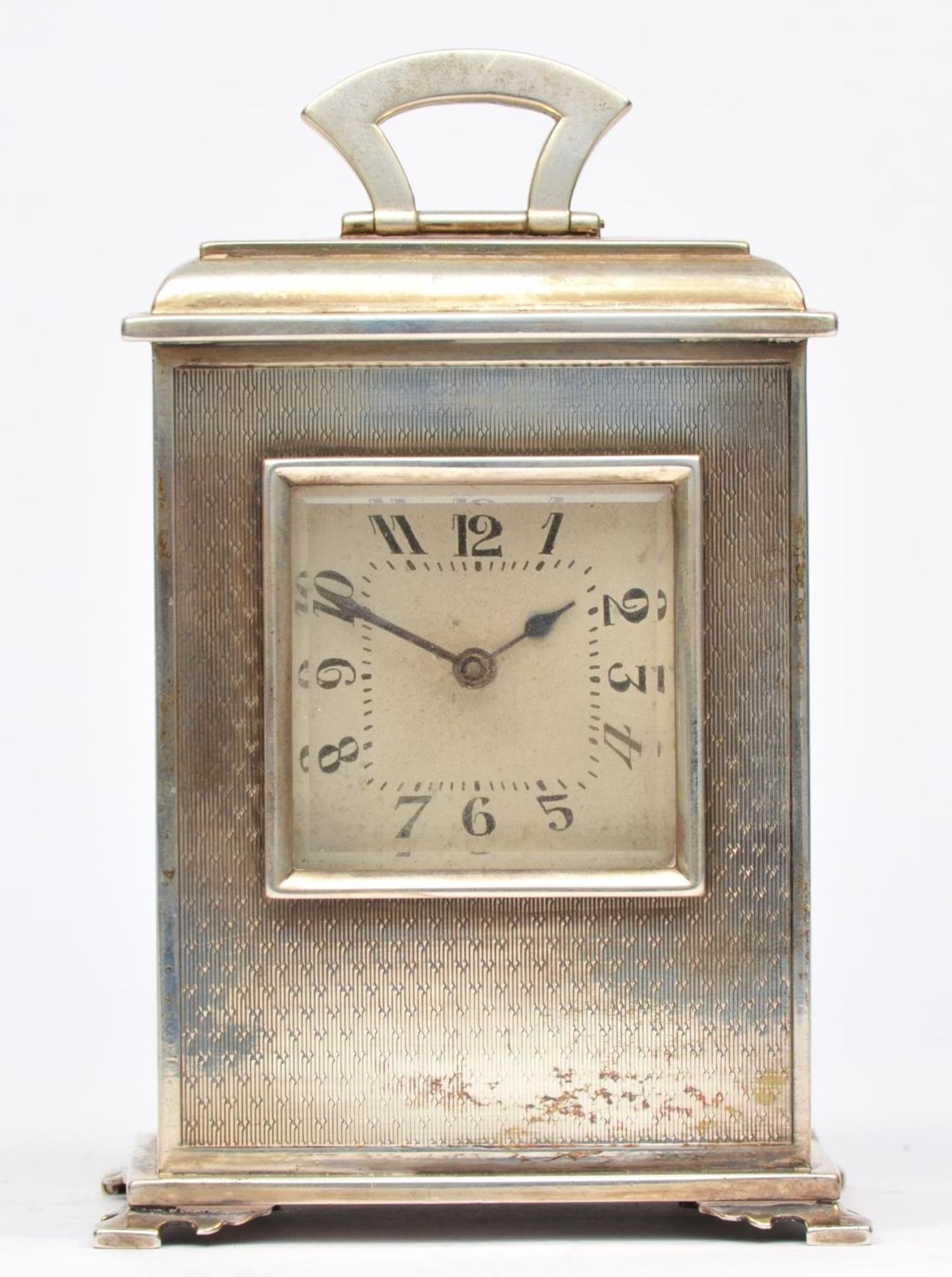 Of 10th Royal Hussars interest; a silver bracket clock, London 1924, the silvered dial with Arabic