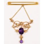 A Victorian 9ct gold, amethyst and half pearl openwork pendant, 9c tab, collet set with oval mixed